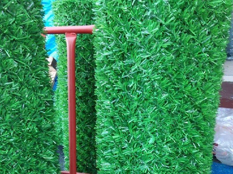 Balcony grass fence installed as a privacy screen on a residential railing